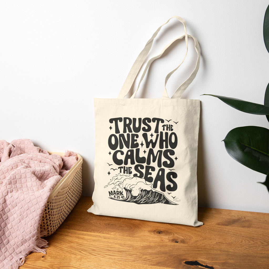 Trust the One Who Calms the Sea Coastal Christian Tote Bag